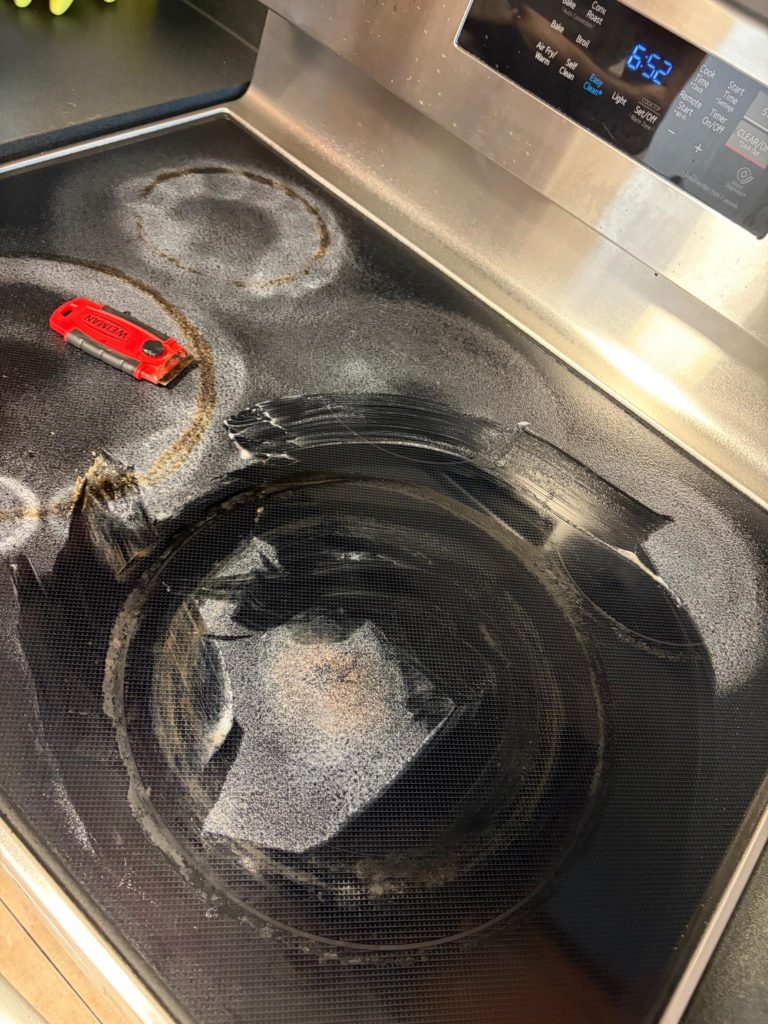 Detailed stovetop cleaning in progress Leronzo cleaner deep cleaning shower tiles in a Toronto home