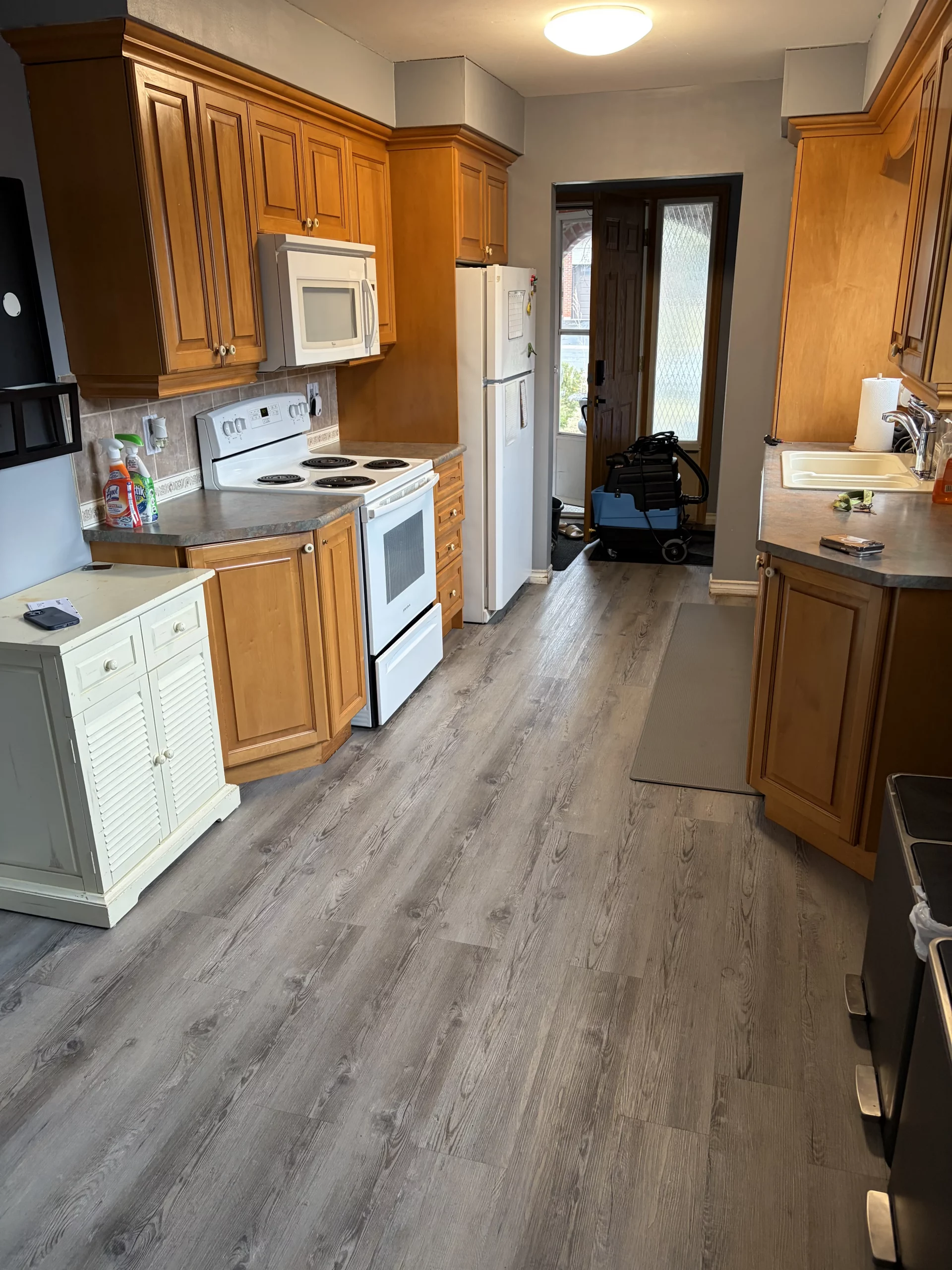 Clean residential kitchen after detailed professional cleaning